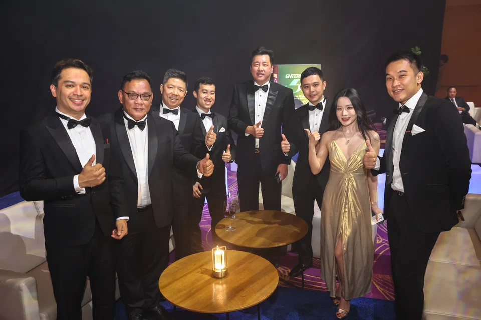 Some of the E50 winners. From left: Dr Samintharaj Kumar s/o Samy Raja, Nuffield Holdings; Sam Chee Keong,
MD of Hock Seng Hoe Metal; Tan Wee Han, CEO of Brewerkz Group; Stefan Tan, executive director & chief sustainability officer, Kinderworld International; Ling Huat Sing, CEO, Four Star Industries; Jeames Cheow, CEO, Crawfort; Mia Jiang, head of business  development, Goodwill Entertainment; Wayne Chen, co-founder & executive director, Elitez Group.