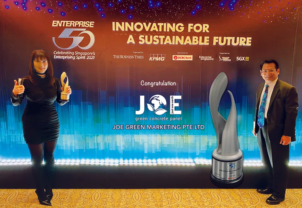 Joe Green Marketing's founder and managing director Boediman Widjaja (right) and marketing director Charlina Lim at the Enterprise 50 Awards in 2021.