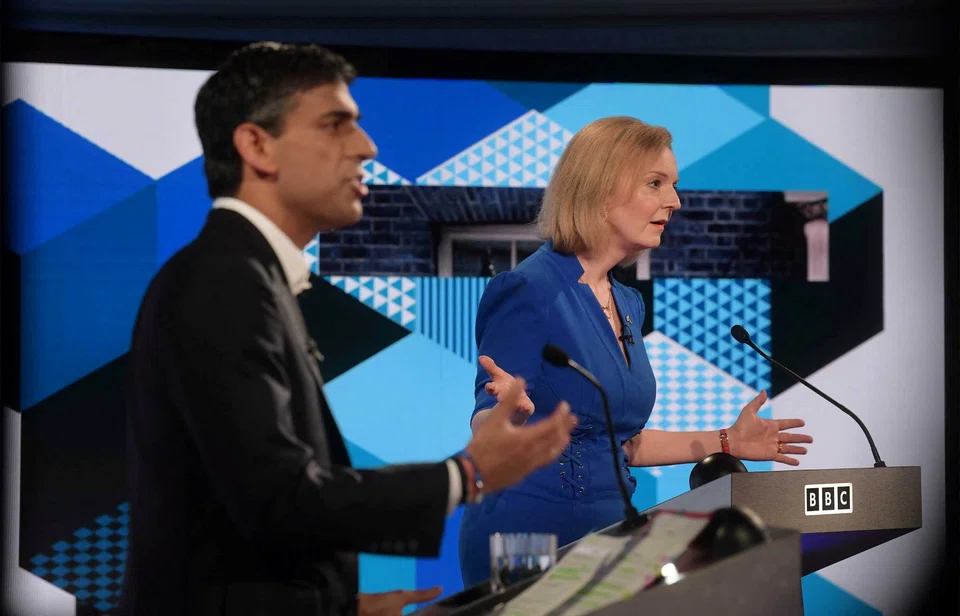Candidates Rishi Sunak and Liz Truss take part in the BBC Conservative party leadership debate  on July 25, 2022.  The Institute for Fiscal Studies accused both  of being irresponsible by offering tax giveaways at a time when borrowing is already set to overshoot. 