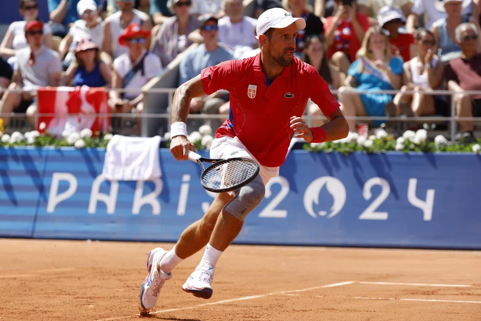 Novak Djokovic (top) of Serbia crushed Rafael Nadal 6-1, 6-4 in their blockbuster Olympics clash.