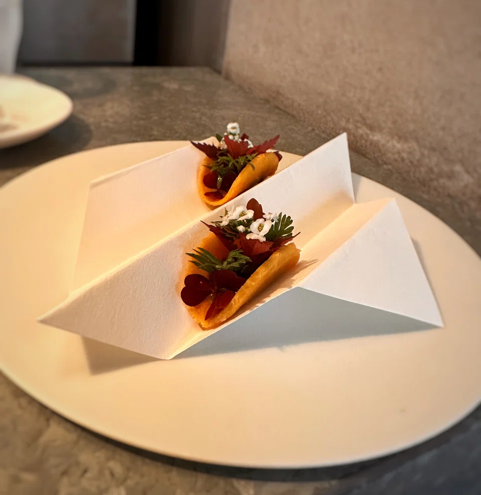 Light and airy parmesan crisps with herbs and flowers.