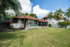 The property sits on one of two land lots held by Ong Tze Guan, the older son of Singapore’s first elected president, and his former sister-in-law Wang Yi Yi.