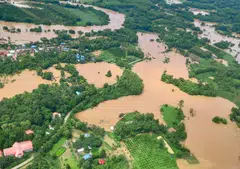 Houses and streets submerged by flood water in the northern province of Phrae, about 540 km from Bangkok, Thailand, Aug 26, 2024.