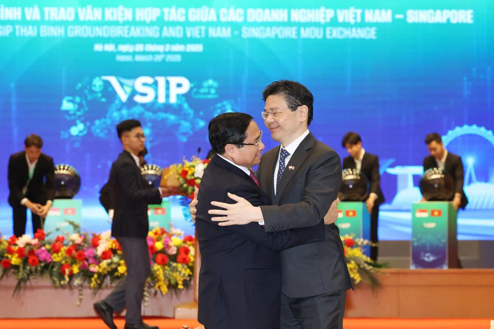 PM Lawrence Wong (right) and his Vietnamese counterpart Pham Minh Chinh at the VSIP ground-breaking event on Mar 26.