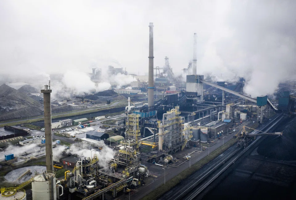 Blast furnaces of Tata Steel in IJmuiden, the Netherlands. The EU's new carbon border adjustment mechanism (CBAM) complements its EU Emissions Trading System (ETS) designed to reduce emissions from power and industry plants. 