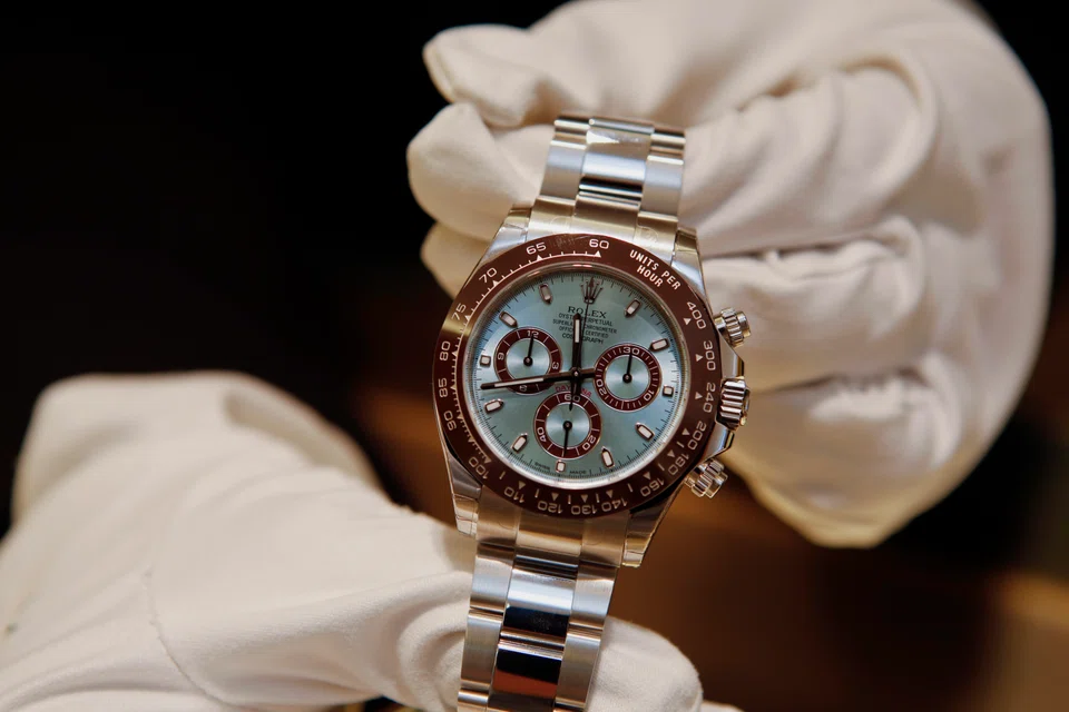 A Rolex Group Daytona watch. 