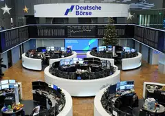 German stocks rallied 0.7% on Friday after Chancellor Friedrich Merz narrowly averted a government crisis by securing an absolute majority for a pensions Bill in parliament.