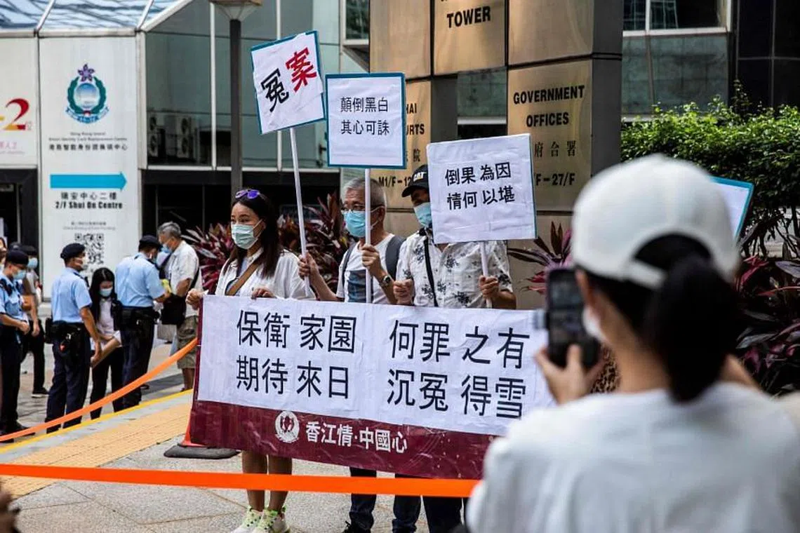 Hong Kong court jails seven over train station mob attack