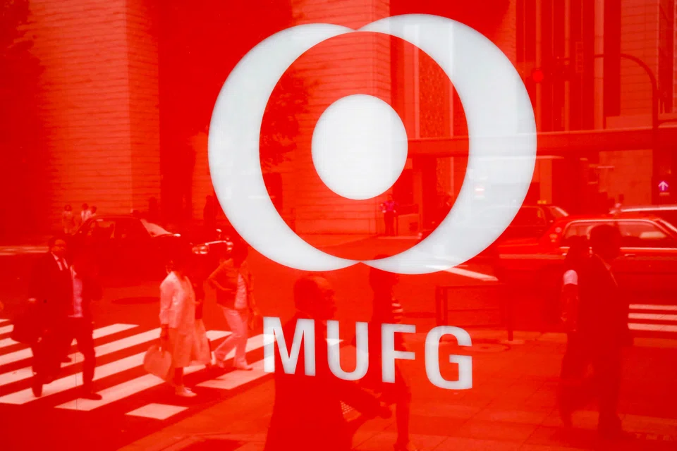 Mitsubishi UFJ Financial Group, the top bank by assets, said second-quarter profit surged 90 per cent on higher interest rates and the sale of cross-held shares. 