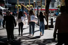 Retail sales slipped 0.1 per cent last month, while data for September was revised higher to show sales increasing 0.9 per cent instead of the previously reported 0.7 per cent rise.