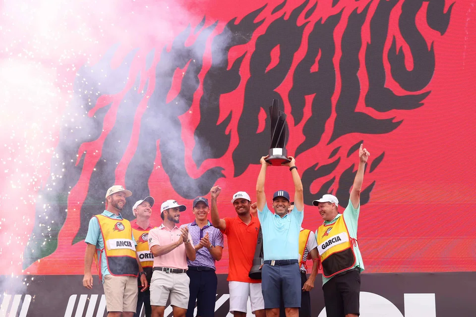 Sergio Garcia (second from right) and his teammates celebrate with their caddies at the LIV Golf Invitational in Bangkok in October 2022.