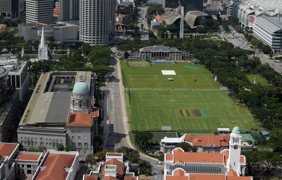 The old City Hall (left) and the Padang (right), with other historical buildings around, on 7 April 2021.
