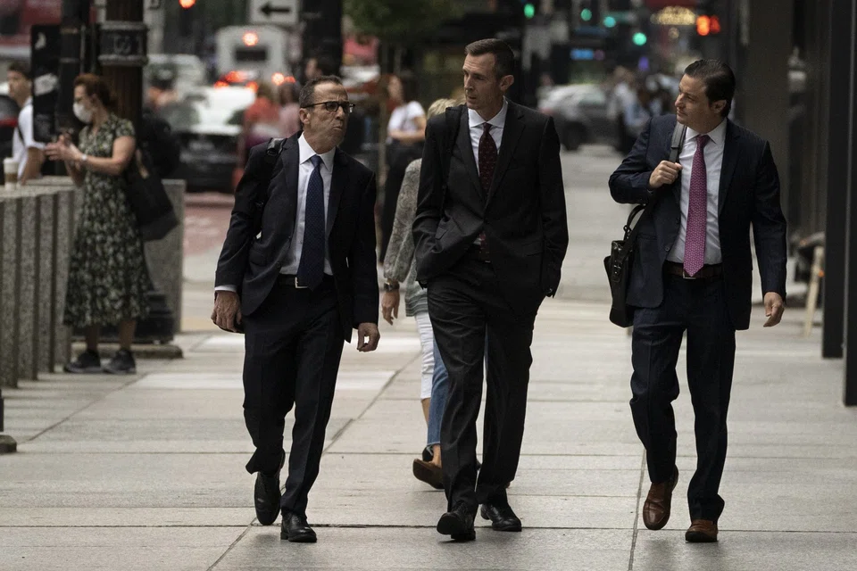 Michael Nowak (centre) and 2 of his former colleagues face criminal charges for thousands of so-called spoofing trades, which prosecutors say were used for years to generate illicit gains for JPMorgan and its top clients. 