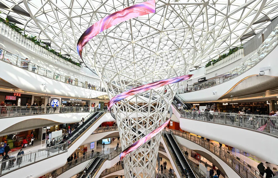 A shopping mall in Beijing. China will boost consumption and actively expand investment in new productive forces and people's overall development, says its finance ministry.
