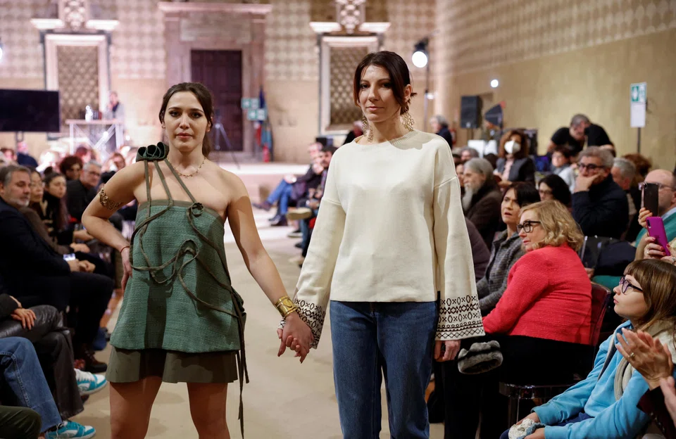 Having learned to make jewellery through a six-month course, Yuliia Dobrohurska (left) sees boundless opportunities opening up before her.