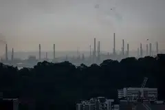 Smoke emitting from the chimneys on Jurong Island. Certifications of major carbon credit frameworks presumably reduce the due diligence required by credit buyers and increase confidence in the certified credits. 