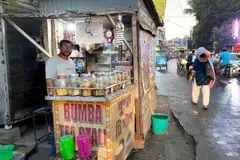 Abhijit Chakraborty, who owns a tea stall in Kolkata, India, is worried that rising cooking gas prices could hurt his earnings.