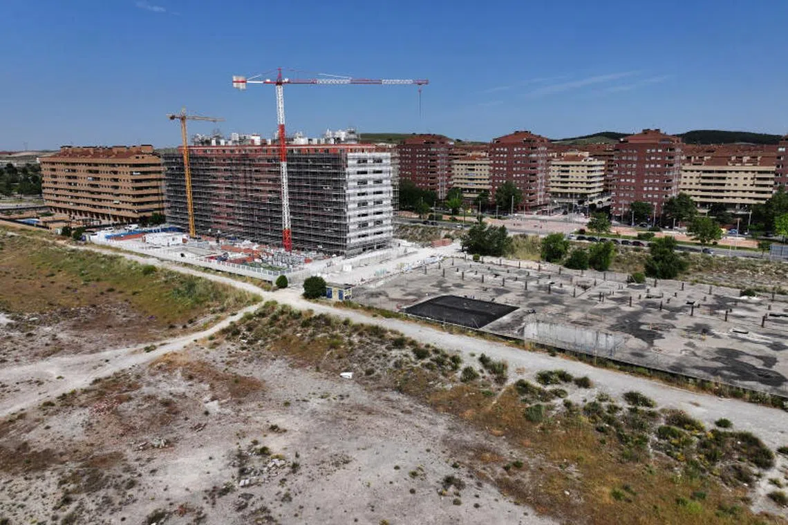 Squatters have gone from this development 40 km south of the capital and middle-class families, driven out of the city centre by an acute housing crisis, are moving in. Construction has also restarted.