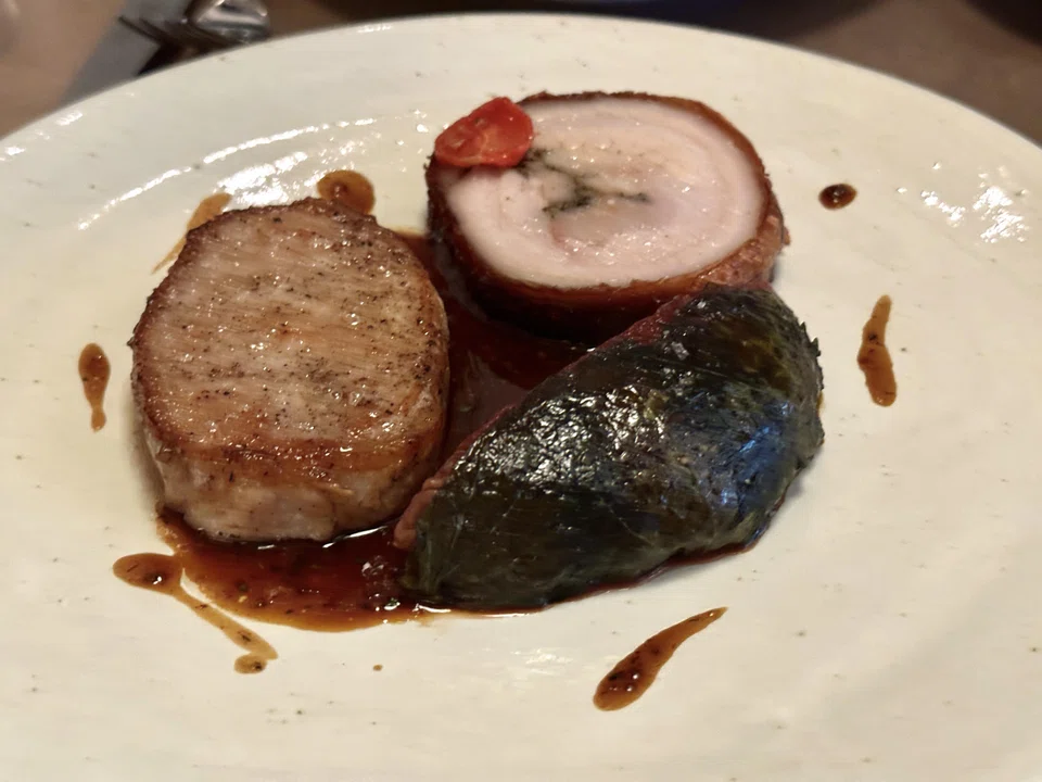 A duo of Iberico pork loin chop and juicy porchetta.