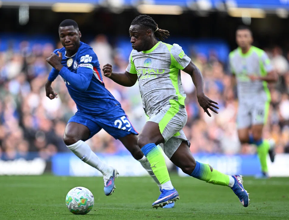 Manchester City's Jeremy Doku (centre) faces off against Chelsea’s Moises Caicedo during their EPL match in London on Apr 12. City’s 3-0 win over Chelsea was more than just three points – it was a statement. 