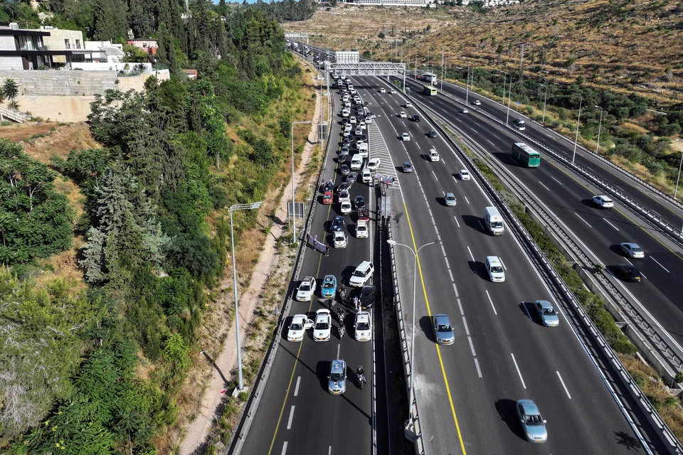 People attempting to block traffic during a protest against Israeli Prime Minister Benjamin Netanyahu's government amid the ongoing conflict in Gaza between Israel and Hamas, in Jerusalem, Israel, June 17, 2024. 