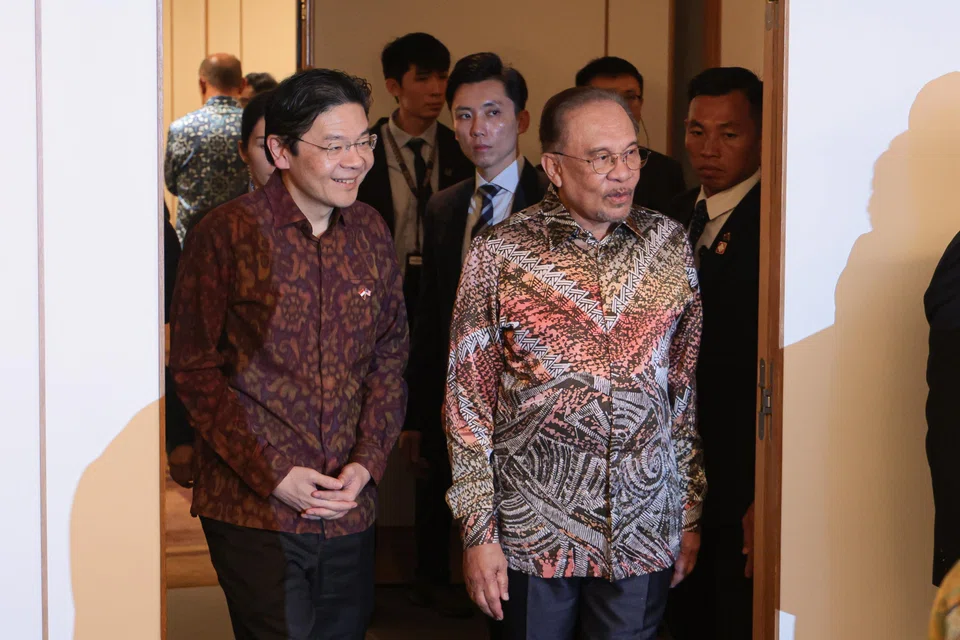 Singapore Prime Minister Lawrence Wong (left) with Malaysian Prime Minister Anwar Ibrahim at the 12th Singapore-Malaysia Leaders' Retreat on Thursday.