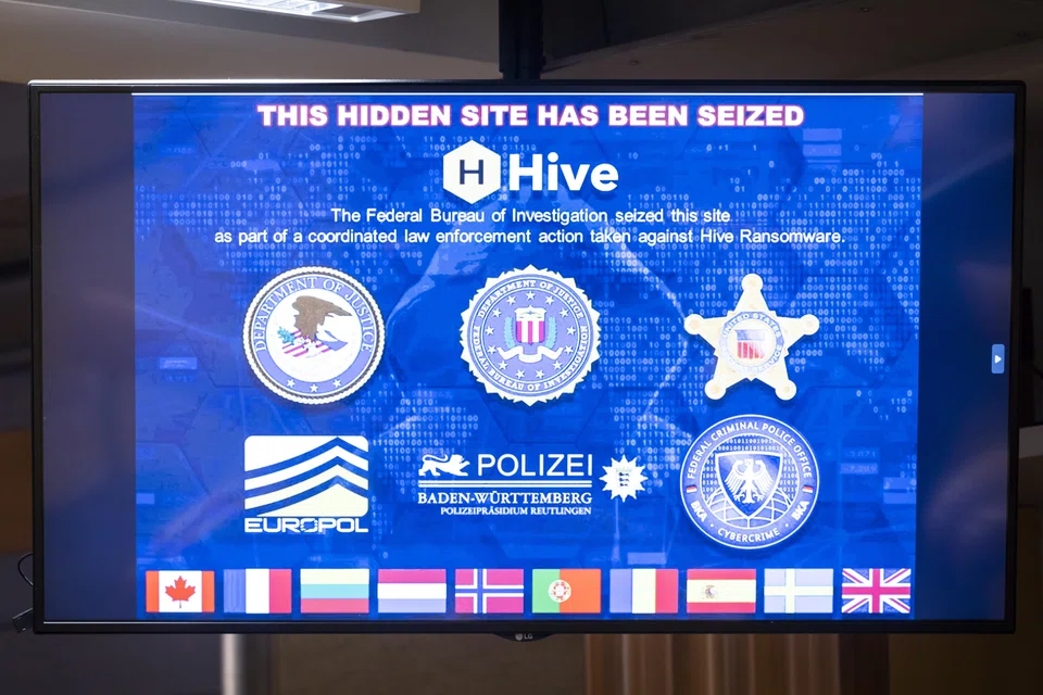 A television screen displays Hive ransomware's website on the so-called dark-web after its seizure by the FBI during a press conference at the Justice Department in Washington DC, USA, Jan 26, 2023. 
