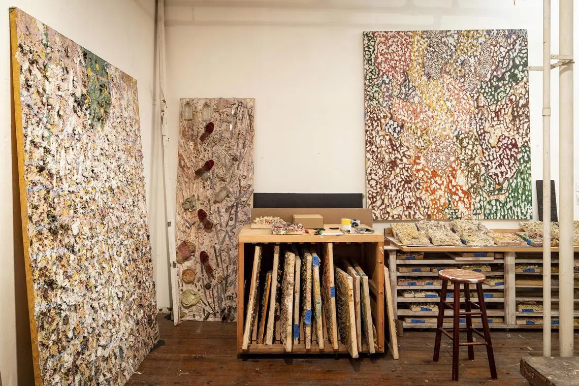 Artwork stored in artist Iria Leino’s loft on Greene Street in New York. Embedded with more than a thousand rocks and pebbles, the 1981 work “The King’s Crown,” far left, weighs almost 200 pounds. 