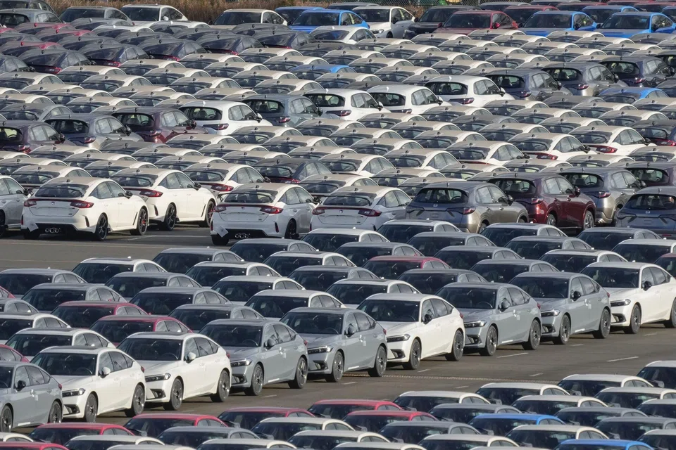 Honda Motor vehicles bound for shipment at a port in Yokohama, Japan, Feb 6, 2025. Japan's trade deficit narrowed by 40 per cent to 3.9 trillion yen on brisk exports of automobiles and chipmaking equipment as well as lower costs of energy imports.