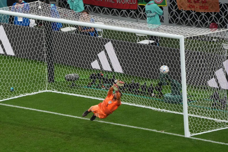 Wales' Gareth Bale scores his first goal past goalkeeper Matt Turner of the United States at Ahmad Bin Ali Stadium in Doha, Qatar, on Nov 21, 2022.