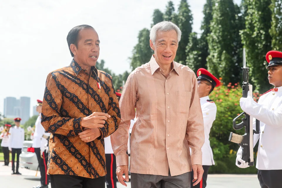 Prime Minister Lee Hsien Loong (right) with Indonesian President Joko Widodo at the Singapore-Indonesia Leaders' Retreat In 2023. The upcoming retreat will be Lee’s seventh and final bilateral meeting with Widodo.