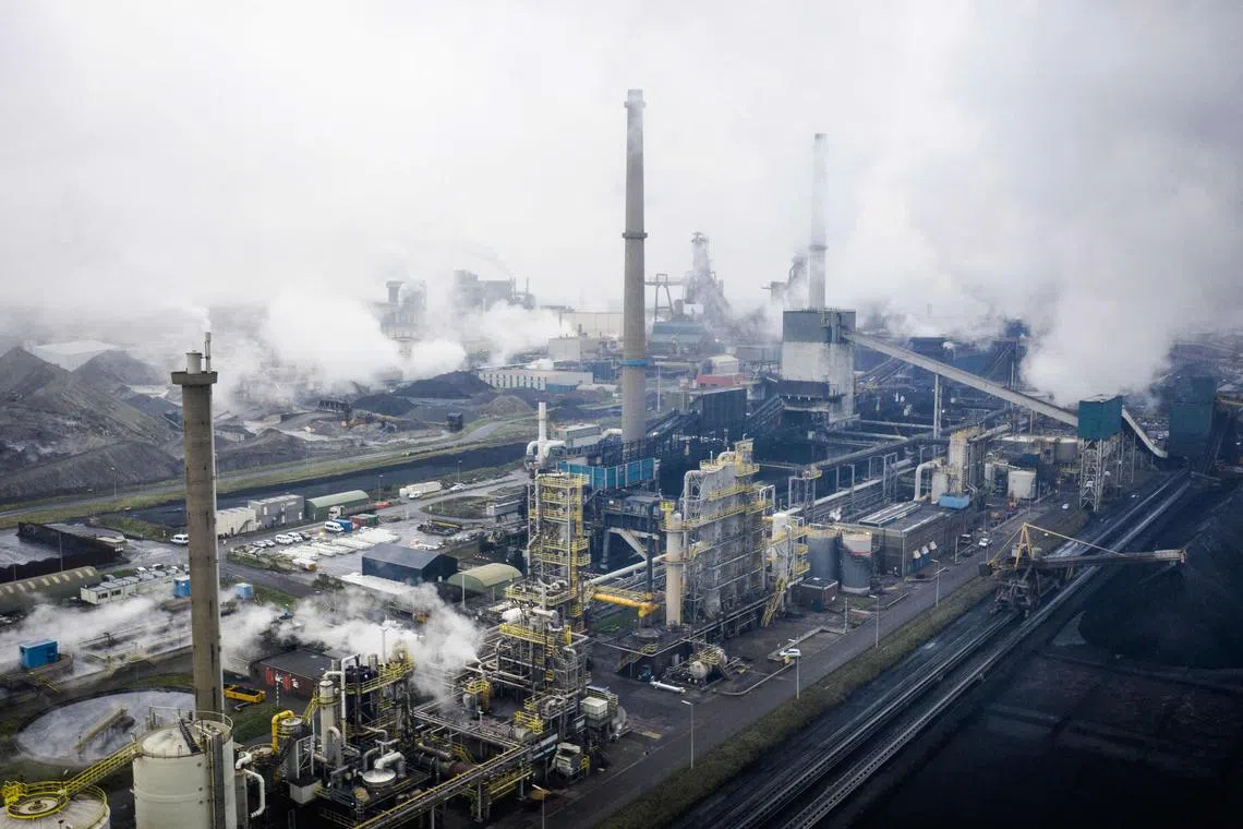 Blast furnaces of Tata Steel in IJmuiden, the Netherlands. The EU's new carbon border adjustment mechanism (CBAM) complements its EU Emissions Trading System (ETS) designed to reduce emissions from power and industry plants. 