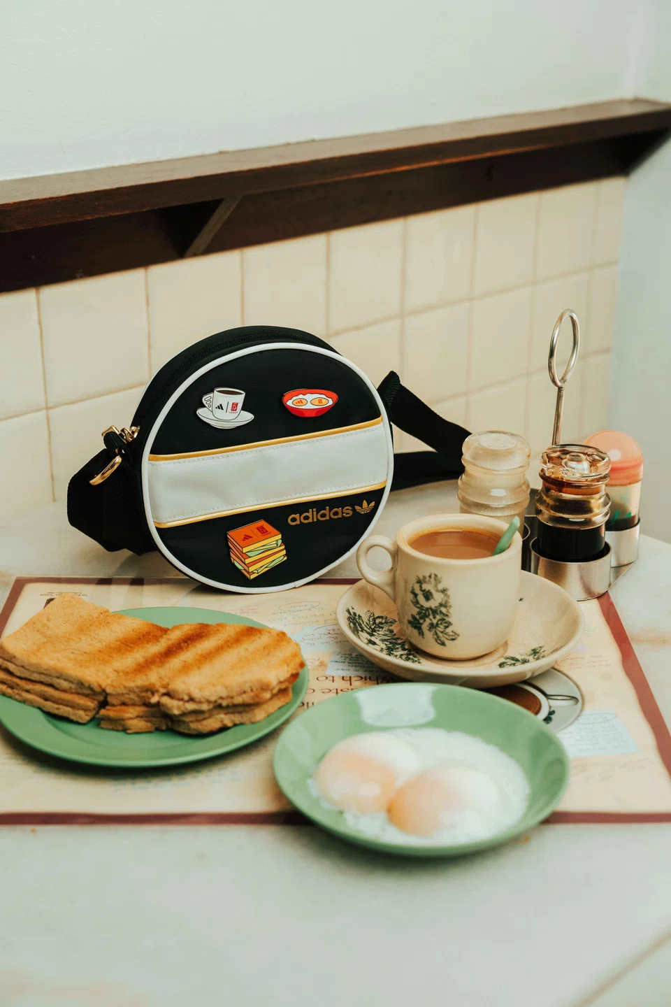 Ya Kun Kaya Toast and Adidas collaborated to produce apparel for Singapore's 59th National Day.