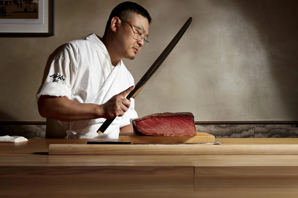 Sushi chef E Ran uprooted from his native Beijing to set up shop in Singapore.