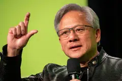 Jensen Huang, in his signature black leather jacket, has become a celebrity in the AI era.