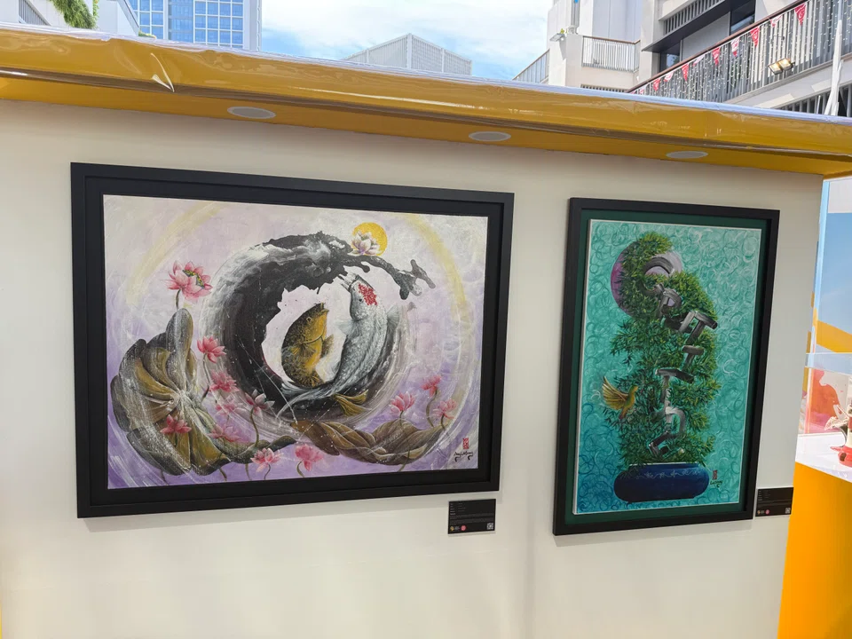 Artworks by Ang Lai Seng, an inmate in Changi Prison, on display at the Yellow Ribbon Community Arts Festival. His works are inspired by religious imagery and Chinese cultural symbols.