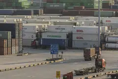 Shipping containers at the Yangshan Deepwater Port in Shanghai.  Fraudsters operating globally in gangs falsify documents, impersonate the various players along the supply chain in order to steal cargo or direct payments into their own pockets. 