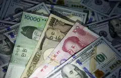 Several Asian currencies have weakened against the US dollar over the past month.