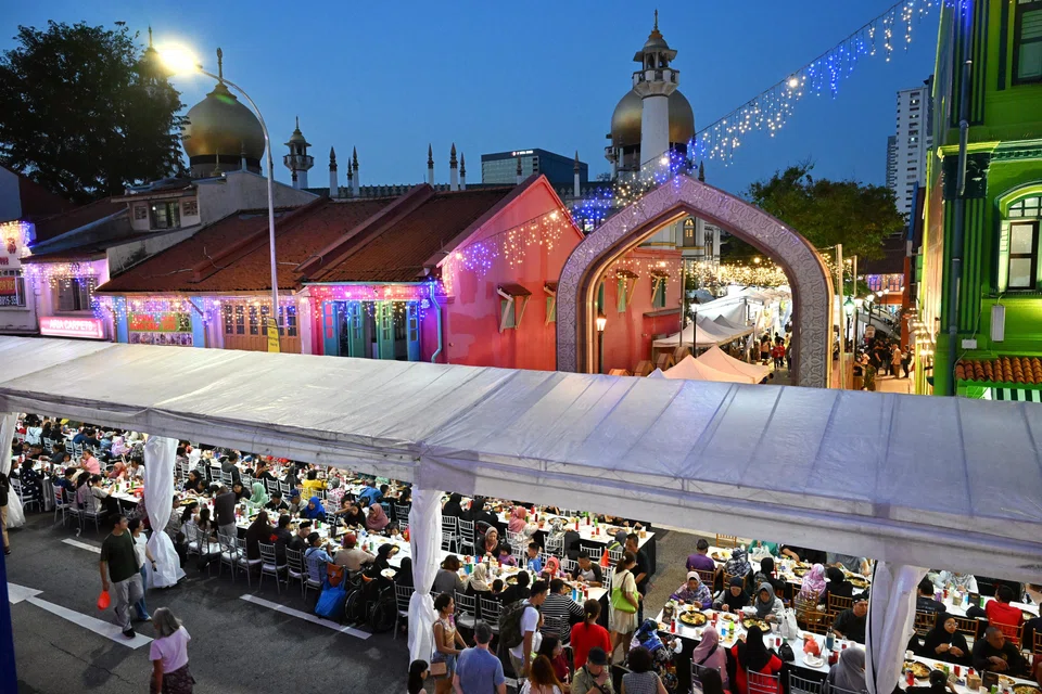 Tables spanning more than 200 metres were laid out along Arab Street near Sultan Mosque for the mass Iftar on March 23. Engaging in activities that make our civic spaces culturally vibrant and distinctive is a way for every citizen and resident to contribute in building a unique and loveable home for themselves, their families and their friends. 