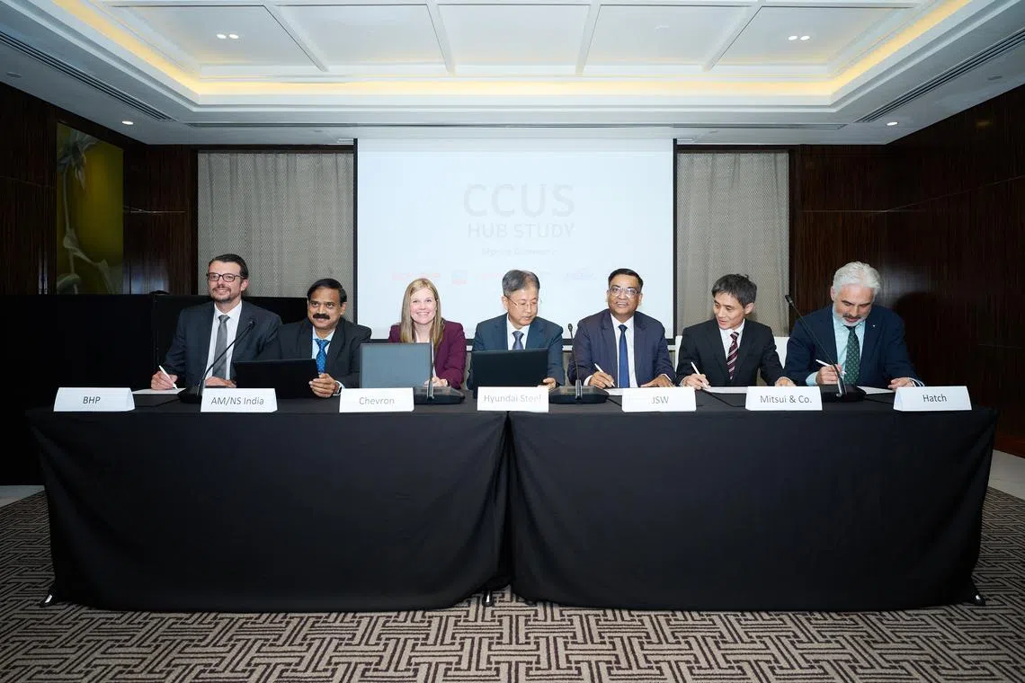 (From left) Michiel Hovers of BHP, Dr Arvind Bodhankar of Arcelor Mittal Nippon Steel India, Alice Flesher of Chevron, Kim Yong-hee of Hyundai Steel, Prabodha Archarya of JSW Steel, Ken Yasuhara of Mitsui & Co and Jan Kwak of Hatch at the MOU signing on Aug 7.                              