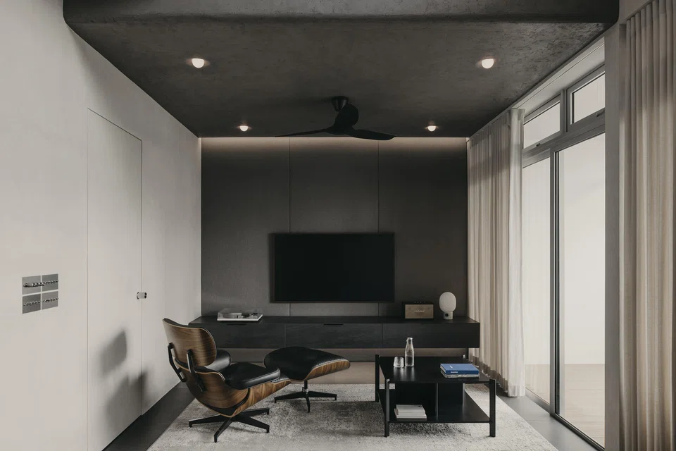 The living area's monochromatic palette projects a sense of calm.