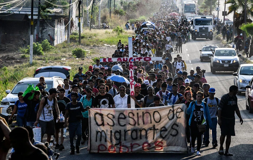 A group of migrants of different nationalities leading a caravan that aims to reach the border between Mexico and the United States, leaving from Tapachula, Chiapas state, Mexico on March 25, 2024. 