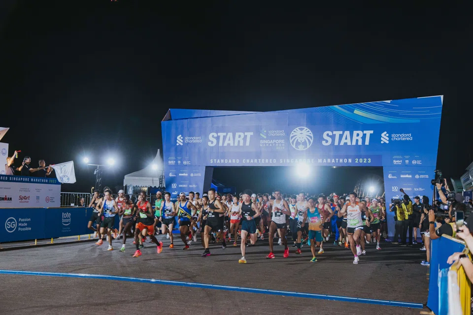Runners zoom off at the starting point at the 2023 Standard Chartered Singapore Marathon.
