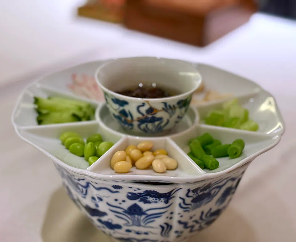 Blackbean paste noodles with condiments.