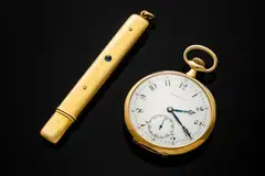 John Jacob Astor IV’s 18K gold Patek Philippe pocket watch, along with his gold pencil case.