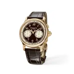 The Ref 5370R-001 rose gold split-seconds chronograph features a brown Grand Feu enamel dial with beige champlevé enamel subdials and tachymeter scale. 