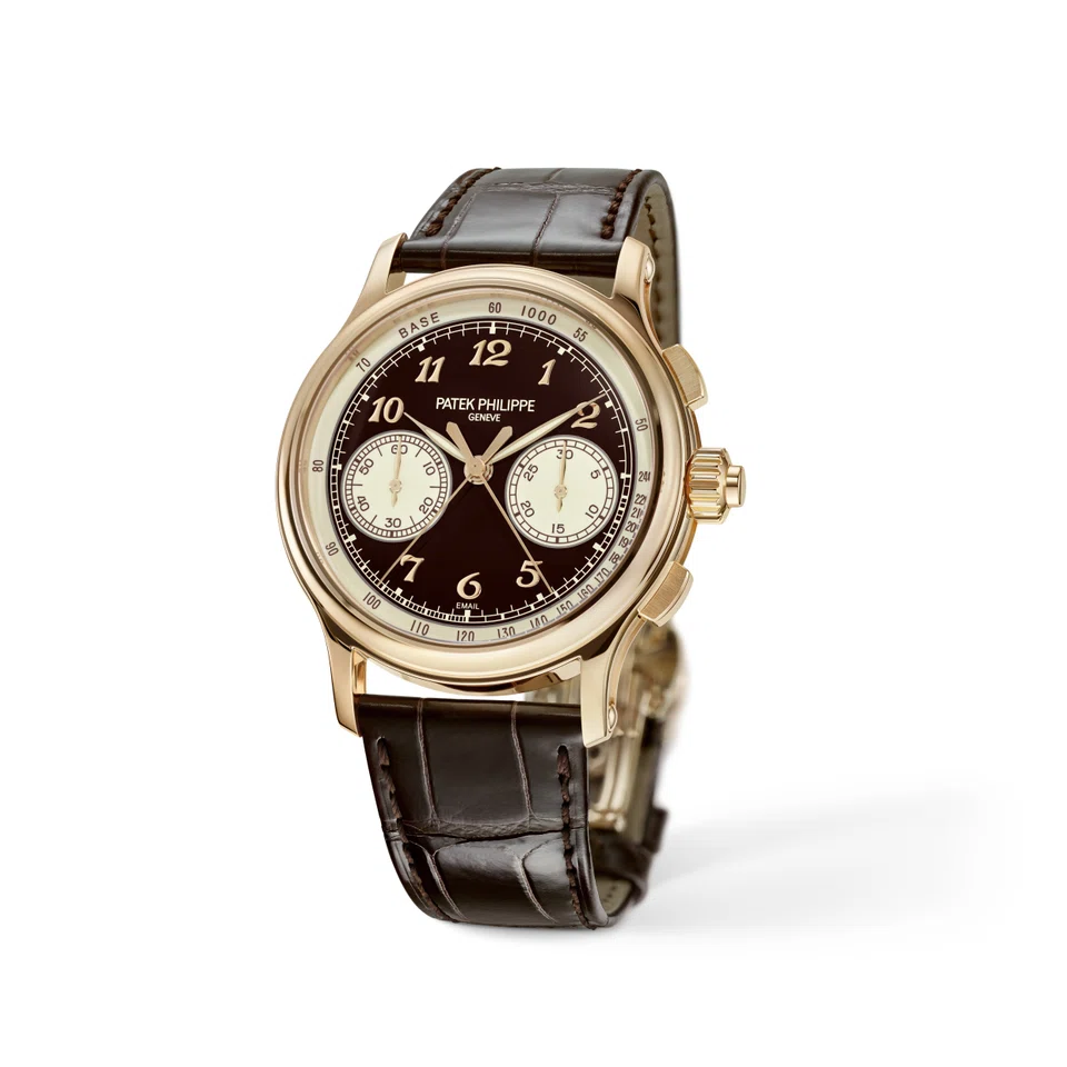 The Ref 5370R-001 rose gold split-seconds chronograph features a brown Grand Feu enamel dial with beige champlevé enamel subdials and tachymeter scale. 