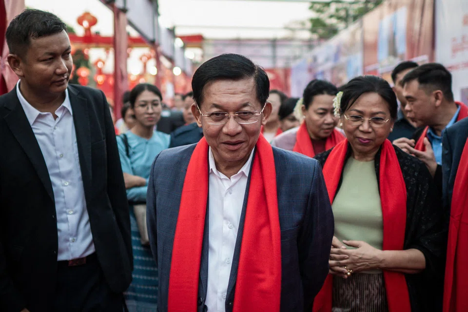 The move allows junta chief Min Aung Hlaing (centre) to retain control over Myanmar grappling with an economy battered by the civilian conflict and US sanctions. 