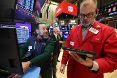 The Dow Jones Industrial Average fell 7.15 points, or 0.01 per cent, to 48,724.01. 