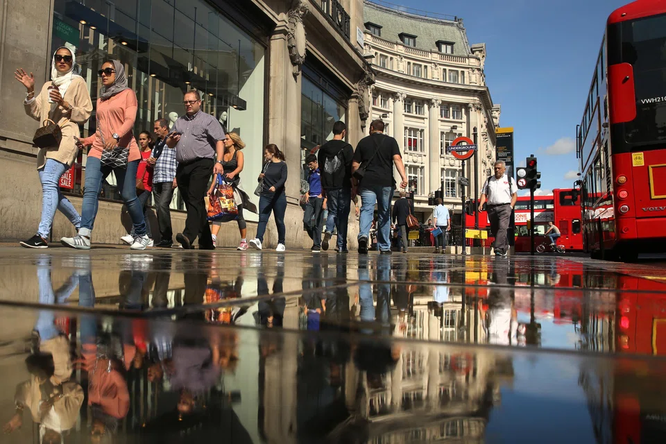 Retail sales in the UK dropped more than expected in October as consumers reined in spending ahead of the Budget.